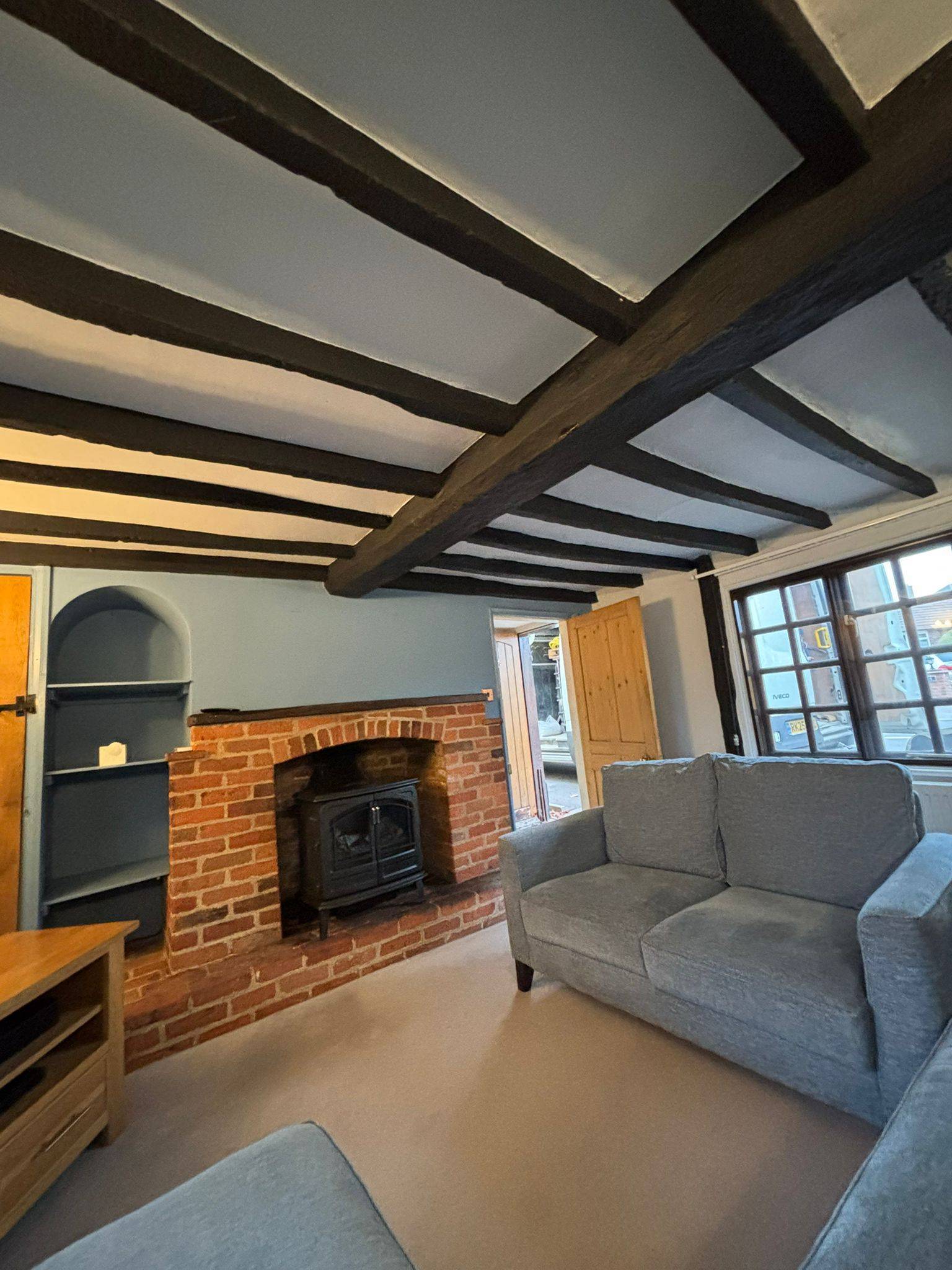 Brightened natural oak beams — after
